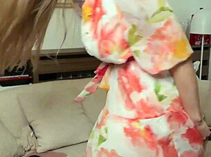 playful blonde teases with sexy dress dance