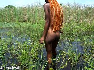 slim ebony beauty bares narrow ass bathing softly outdoors