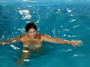 hot day redhead enjoys pool fully nude