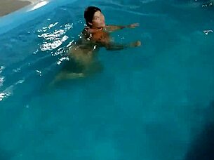 hot day redhead enjoys pool fully nude