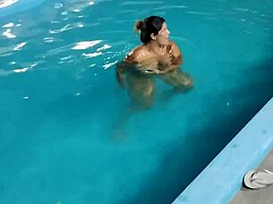 hot day redhead enjoys pool fully nude