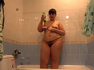 Chubby russian milf showers hairy pussy do you get excited bathing?