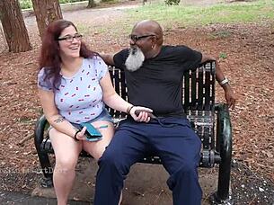 Nerdy Milf Grips and Sucks Massive Black Cock Outdoors Publicly