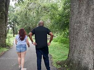 Nerdy Milf Grips and Sucks Massive Black Cock Outdoors Publicly
