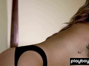 Curvy brunette babe strips to naked stockings posing sexy