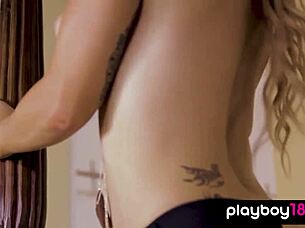 Curvy brunette babe strips to naked stockings posing sexy