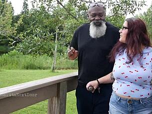 Nerdy Milf Grips and Sucks Massive Black Cock Outdoors Publicly