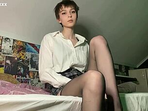 Skinny brunette teases shaved pussy to intense orgasm