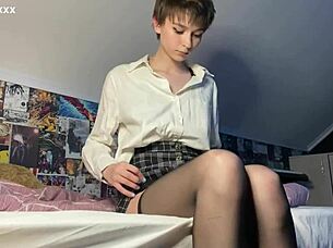 Skinny brunette teases shaved pussy to intense orgasm