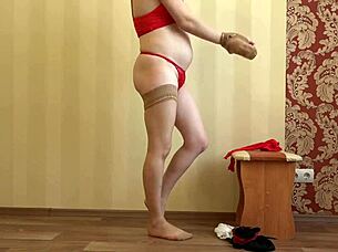 a pregnant milf models nylon stockings for foot fetish fun