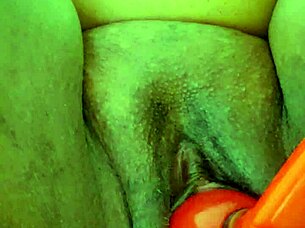 playing with a kong toy stretching her hole gaping wide