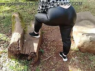 two hot babes flashing their big tits and asses on public garden street