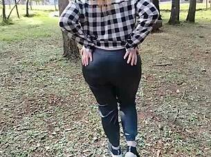 two hot babes flashing their big tits and asses on public garden street