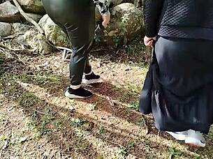 two hot babes flashing their big tits and asses on public garden street