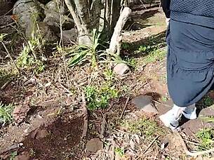 two hot babes flashing their big tits and asses on public garden street