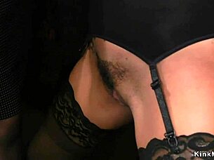 Dominatrix milf whips bound busty lesbian slave.