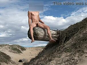 hey watch me pose nude teasing my hard cock at the public beach before cumming everywhere in the plaza