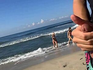 i flash my cock on public beach and score double milf handjob prize