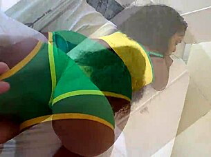 Busty ebony babe fucked through hole in booty shorts