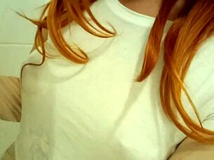 Redhead Relaxes In Steamy Bath