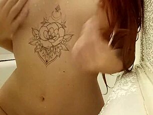 Redhead Relaxes In Steamy Bath