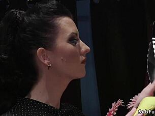 A submissive guy sniffs feet then takes anal in femdom