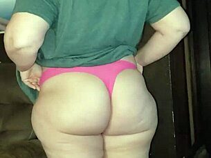 pregnant redhead milf relaxes wet on living room sofa