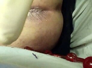 brunette pegs boyfriend's ass with huge strapon breaking him wide