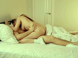 amateur couple shares romantic kisses and sensual breast sucking