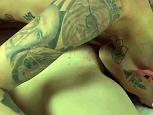 Goth lesbians finger pussies to mutual orgasm bliss.