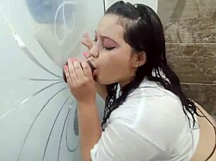 playing in bathroom wearing tight shirt while fingering wildly