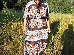 hairy chubby mature flashes pussy on nudist beach