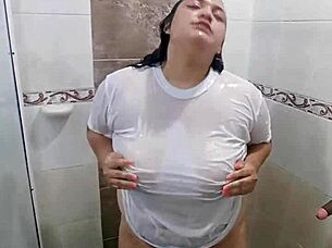 playing in bathroom wearing tight shirt while fingering wildly