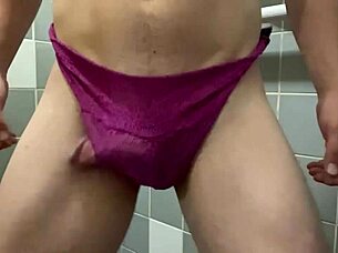 She slips into her favorite purple panties for the evening.