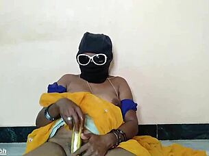 south indian auntie stuffs big banana in pussy