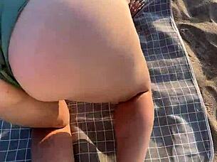 Imagine pounding that big wet ass on the beach, her tight pussy gripping every thrust close-up!
