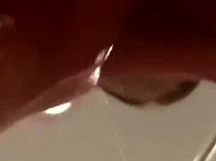 Busty brunette Natasha Nice glows in sexy black light solo tit tease