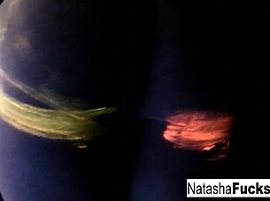 Busty brunette Natasha Nice glows in sexy black light solo tit tease