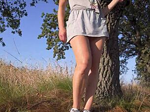 wanna see this short skirt tease flash her full back panties outside?