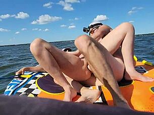 Hot athletic couple bangs doggystyle on jetski amid lake waves
