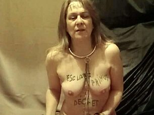 Slave endures belt whips in intense BDSM indoctrination session!