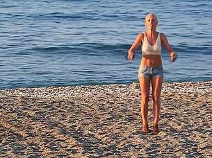 lady's soft breasts bounce gently in bra while clothed