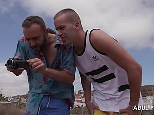 sunbathing between two throbbing cocks?