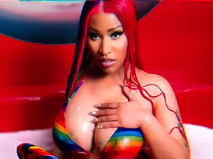 Hey, check out sexy redhead Nicki Minaj's big tits in horny nude action!