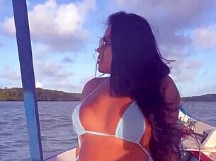 Feels so intense watching this bikini-clad Brazilian latina wife ride on the boat!