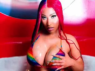 Hey, check out sexy redhead Nicki Minaj's big tits in horny nude action!