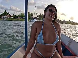 Feels so intense watching this bikini-clad Brazilian latina wife ride on the boat!
