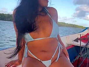 Feels so intense watching this bikini-clad Brazilian latina wife ride on the boat!