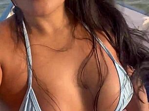 Feels so intense watching this bikini-clad Brazilian latina wife ride on the boat!