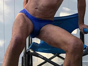 skinny girl stretches deep in blue briefs flashing socks